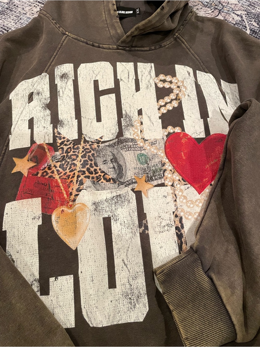 Brown Graphic Hoodie with Red Heart Detail